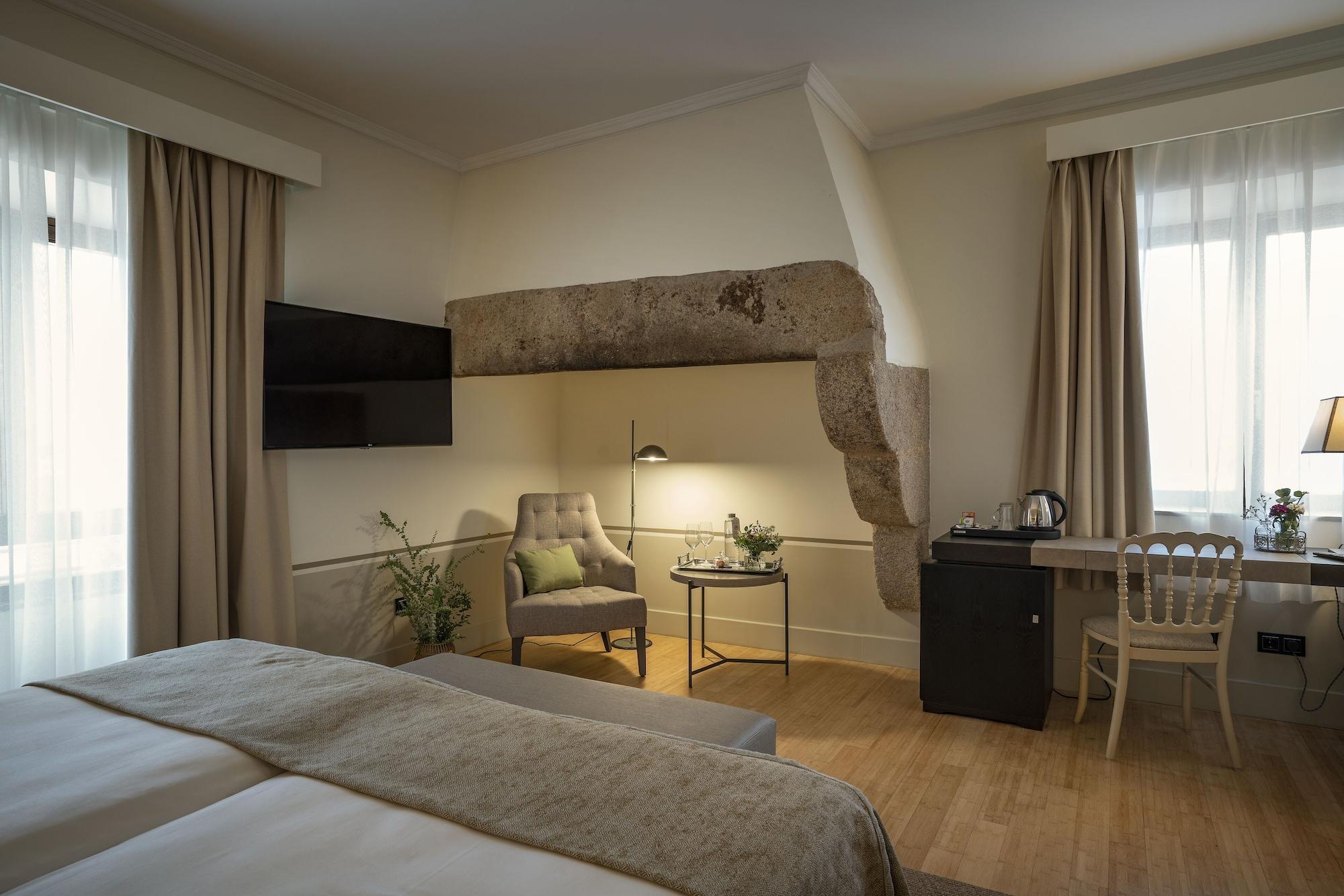 Hospes Palacio De Arenales & Spa Caces Exterior foto A room at the hotel